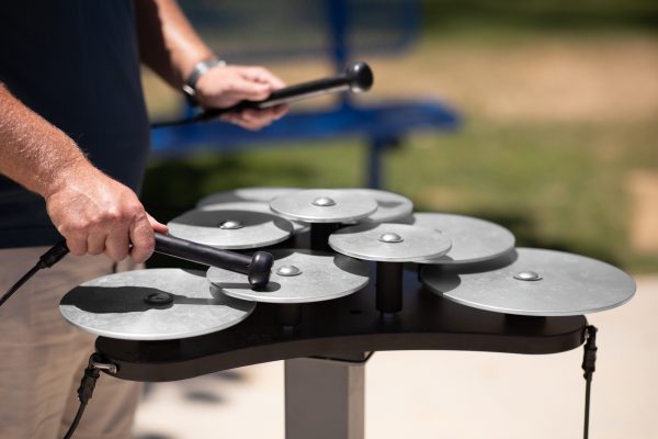Silver lilypad cymbals being played close up needs editing